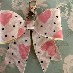 Hand crafted bow keychain. Perfect for purses back packs or luggage.